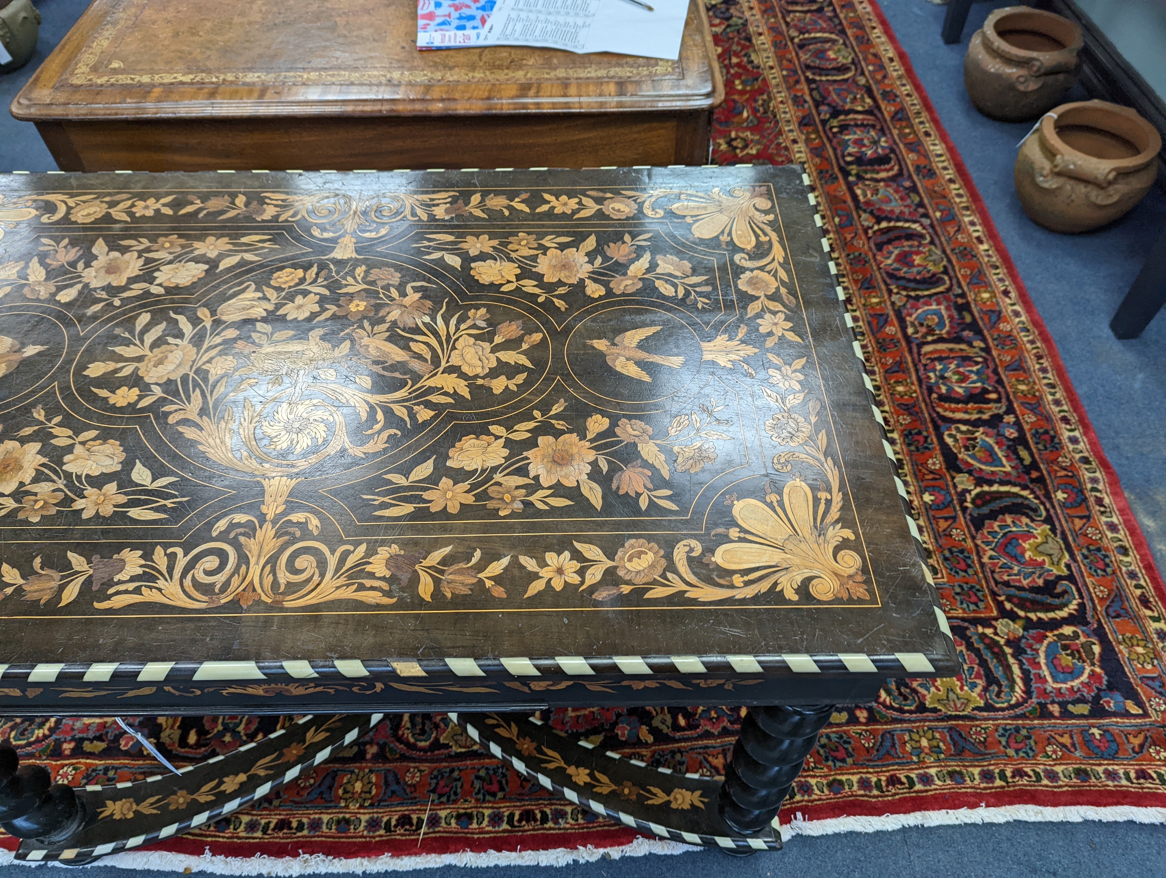 A William and Mary style rectangular marquetry and bone inlaid walnut side table, fitted drawer on ebonised spiral turned under frame with shaped X stretcher width 110cm, depth 67cm, height 78cm